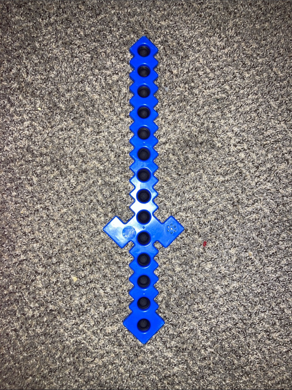 Blue Plastic Sword Toy with Black Accents fidget